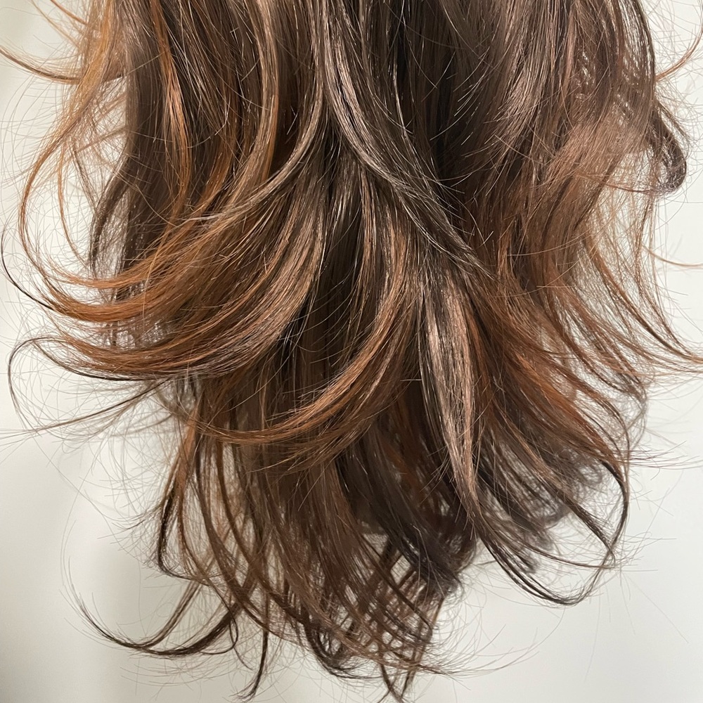 Brown with red highlights synthetic wig.